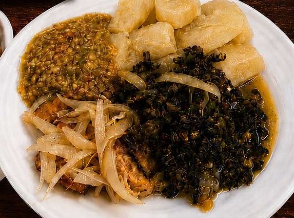 Prato com fumbua, feijão e banana